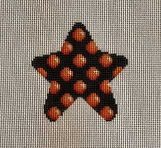 orange dot mini star by Associated Talents (thumbnail)