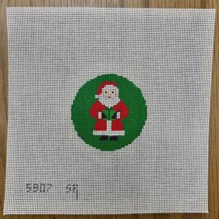 Santa with Present Canvas by Susan Roberts Needlepoint (thumbnail)